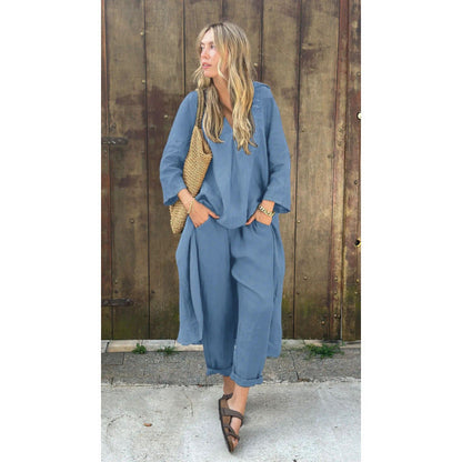 Conjunto de ropa de trabajo: camisa y pantalón holgado de talle alto.