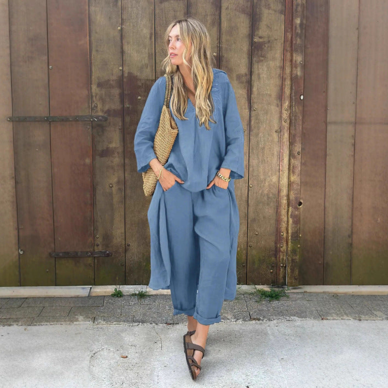 Conjunto de ropa de trabajo: camisa y pantalón holgado de talle alto.