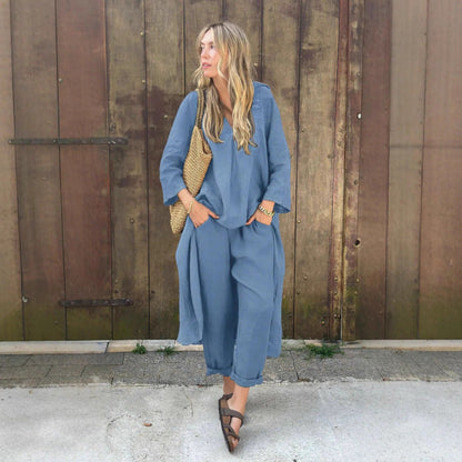 Conjunto de ropa de trabajo: camisa y pantalón holgado de talle alto.